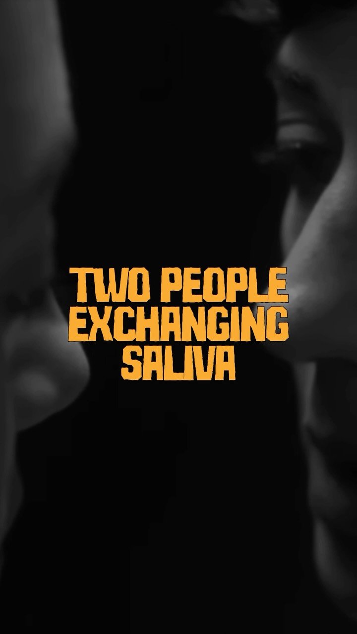 Two People Exchanging Saliva