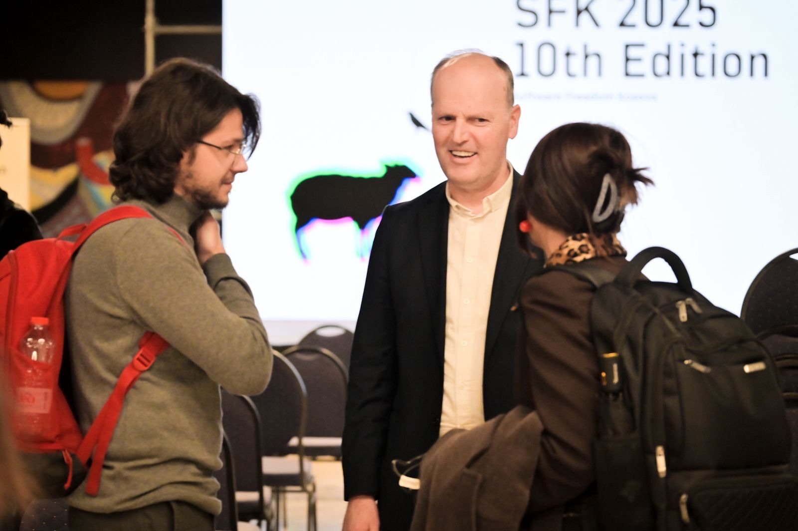 The hall filling up at the tenth edition, 2025